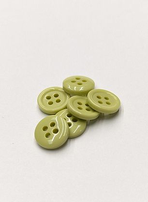 Пуговица костюмная пластик 4 прокола d-11мм светло-салатовая - в интернет-магазине тканей Тессутидея арт. F-6072