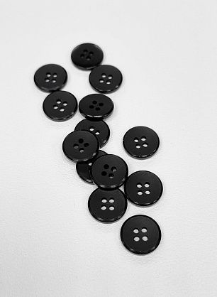 Пуговица пластик 4 прокола d-15мм черная - в интернет-магазине тканей Тессутидея арт. F-7106