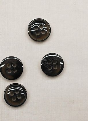 Пуговица пластик под рог 4 прокола d-10мм серо-черная - в интернет-магазине тканей Тессутидея арт. F-6815