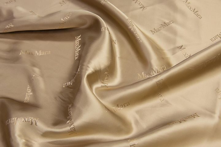 Подкладочная вискоза (о) бежевая с надписью Max Mara - итальянские ткани Тессутидея арт. 08-1190