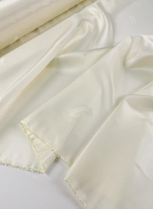 Подкладочная диагональ вискоза с надписью (о) молочная - в интернет-магазине тканей Тессутидея арт. 08-1674