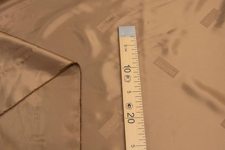 Подкладочная вискоза (о) бронзовая с надписью Max Mara - итальянские ткани Тессутидея арт. 08-1188