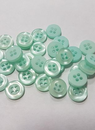 Пуговица пластик 4 прокола d-10мм светло-бирюзовая - в интернет-магазине тканей Тессутидея арт. F-4804