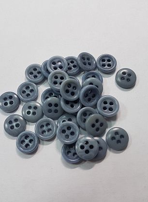 Пуговица пластик 2 прокола d-9мм серо-голубая - в интернет-магазине тканей Тессутидея арт. F-5314