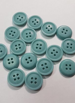 Пуговица пластик 4 прокола d-15мм светло-бирюзовая - в интернет-магазине тканей Тессутидея арт. F-5435