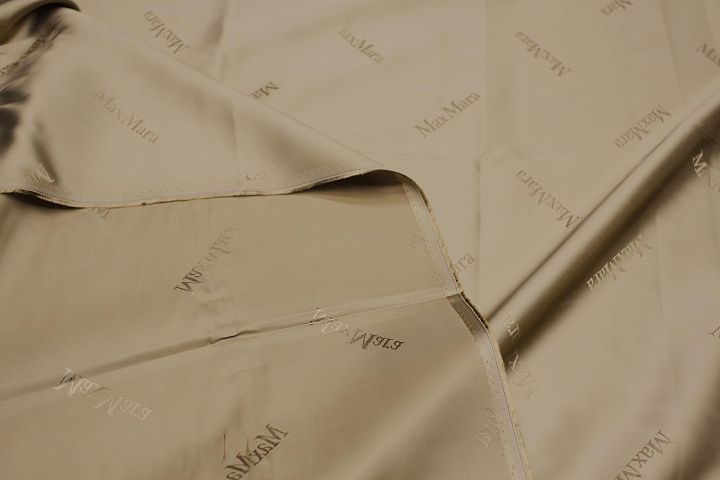 Подкладочная вискоза (о) бежевая с надписью Max Mara - итальянские ткани Тессутидея арт. 08-1437