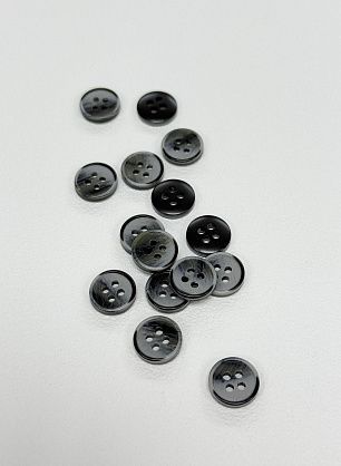 Пуговица пластик под рог 4 прокола d-11мм серо-черная - в интернет-магазине тканей Тессутидея арт. F-7128