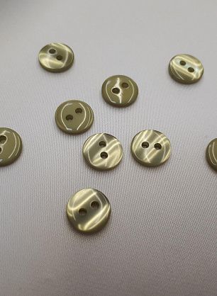 Пуговица пластик 2 прокола светло-зеленая d-11мм - в интернет-магазине тканей Тессутидея арт. F-4030