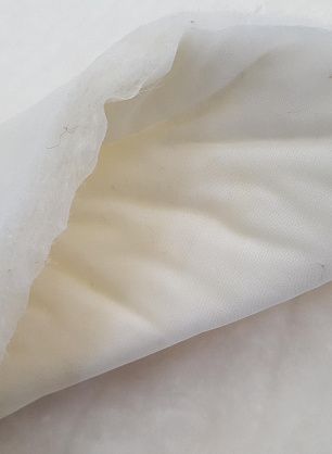 Утеплитель Thindown пух утка (о) молочный 80 г/м - в интернет-магазине тканей Тессутидея арт. 07-1287