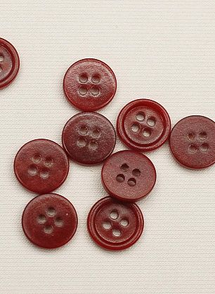 Пуговица пластик 4 прокола d-11мм темно-красная с ободком - в интернет-магазине тканей Тессутидея арт. F-6555