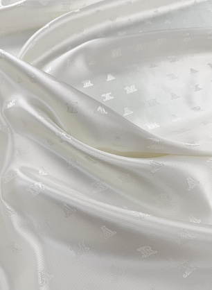 Подкладочная вискоза с надписью (о) айвори - в интернет-магазине тканей Тессутидея арт. 08-1676