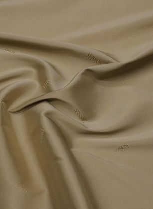 Подкладочная стрейч (о) бежевая с надписью Versus - в интернет-магазине тканей Тессутидея арт. 07-1435