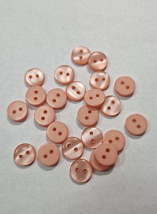 Пуговица пластик 2 прокола d-9мм розовая - в интернет-магазине тканей Тессутидея арт. F-5760