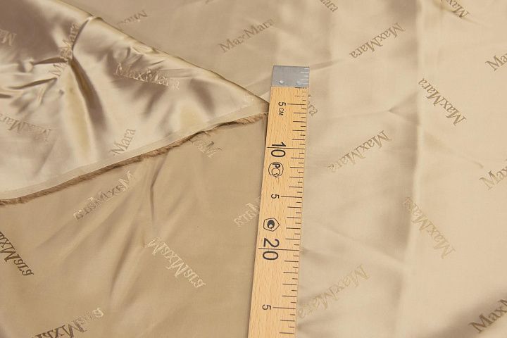 Подкладочная вискоза (о) бежевая с надписью Max Mara - итальянские ткани Тессутидея арт. 08-1190