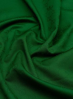 Костюмная (о) жаккардовый логотип на зеленом - в интернет-магазине тканей Тессутидея арт. 03-6965