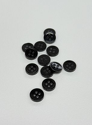 Пуговица пластик 4 прокола d-9мм черная - в интернет-магазине тканей Тессутидея арт. F-7139