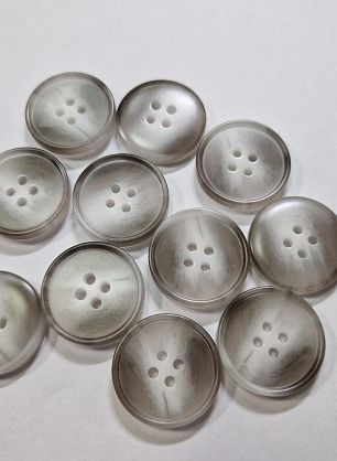 Пуговица костюмная пластик 4 прокола d-23мм серая с белыми вкраплениями - в интернет-магазине тканей Тессутидея арт. F-5919